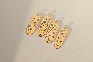 Collier Poissons écrit dans les étoiles