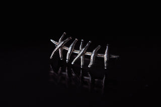 Grimpeur d'oreille de suture